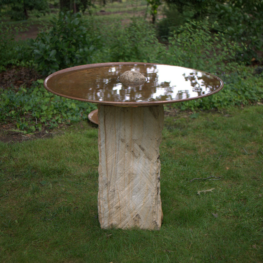 Large Dish on Sandstone Plinth