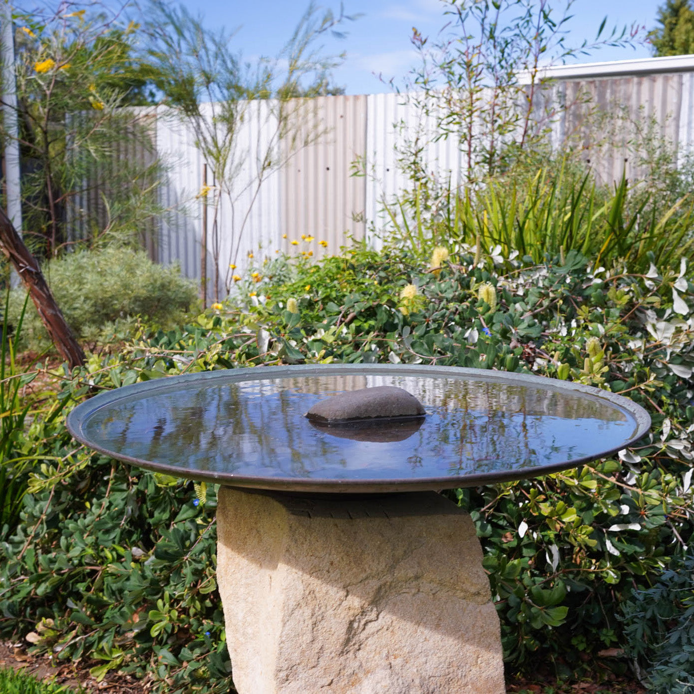 Large Dish on Sandstone Plinth