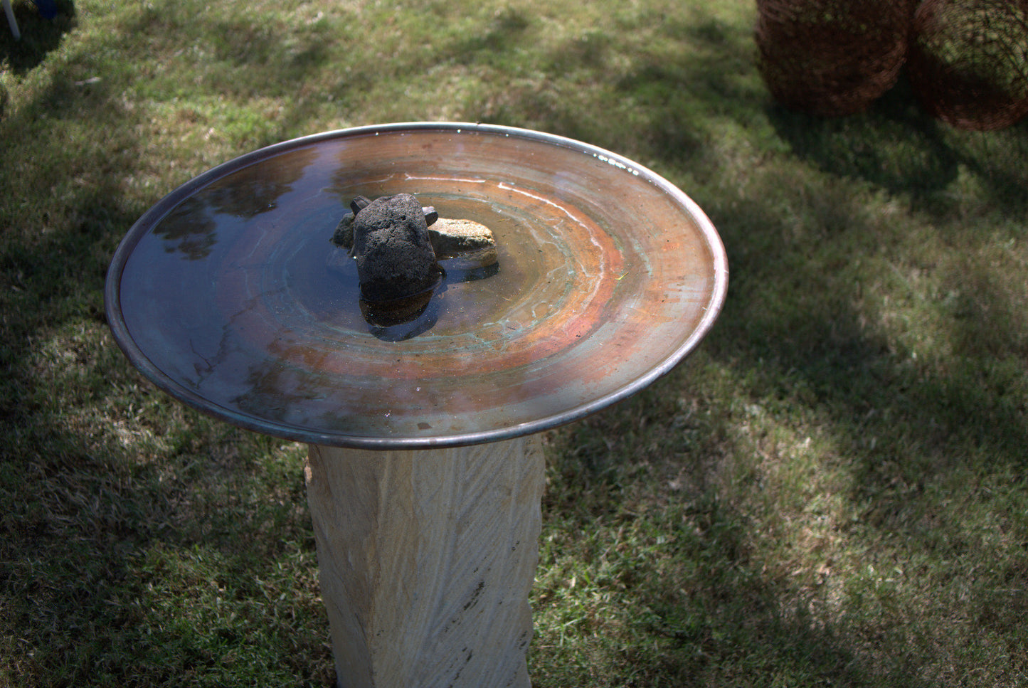 Large Dish on Sandstone Plinth