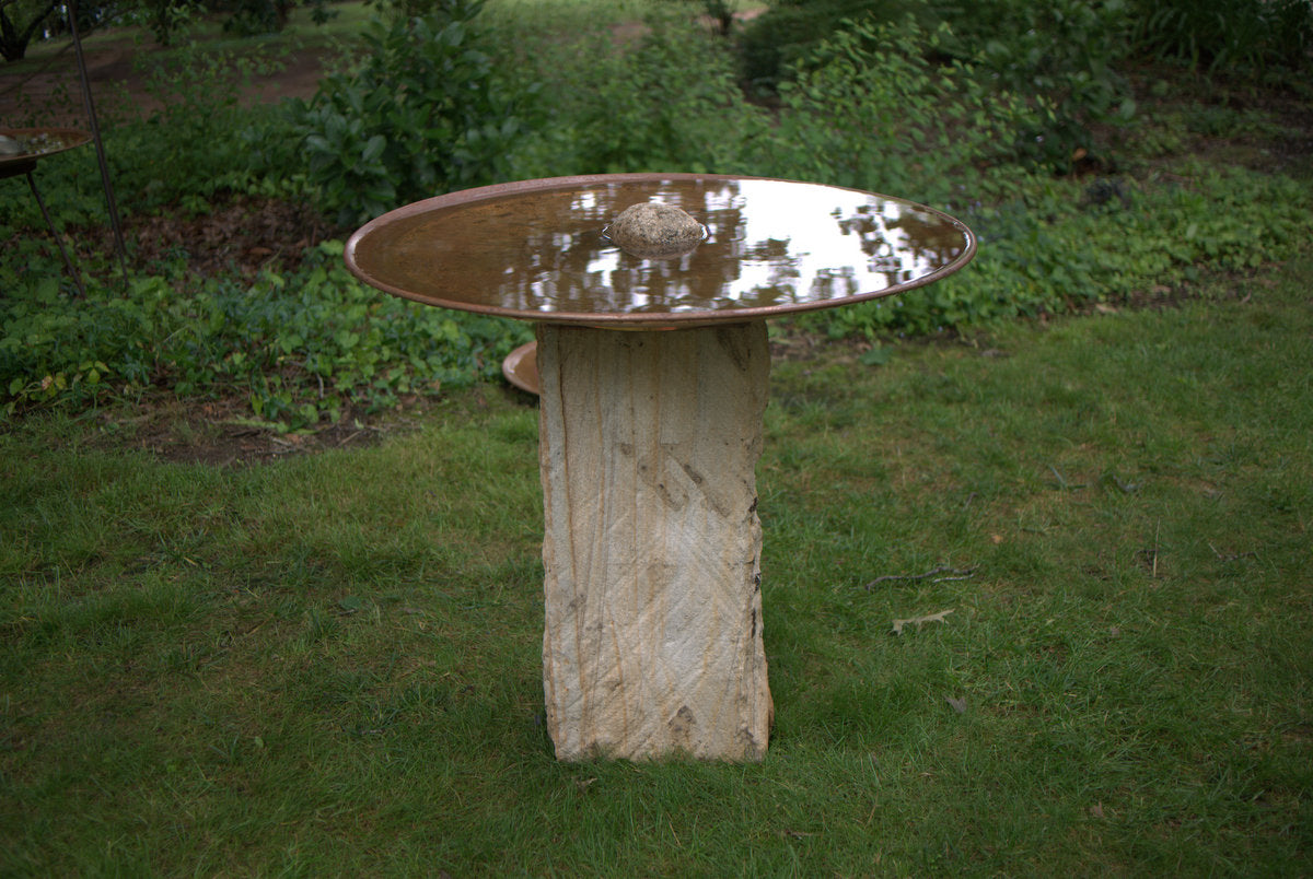 Large Dish on Sandstone Plinth